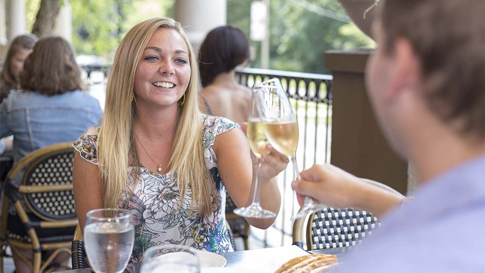 Two people enjoying a meal at the Bistro.