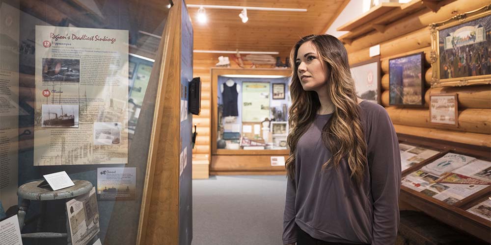 A person viewing a display at the North Berrien Historical Museum