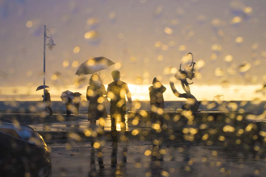 Water droplets at sunset photo by Joshua Nowicki