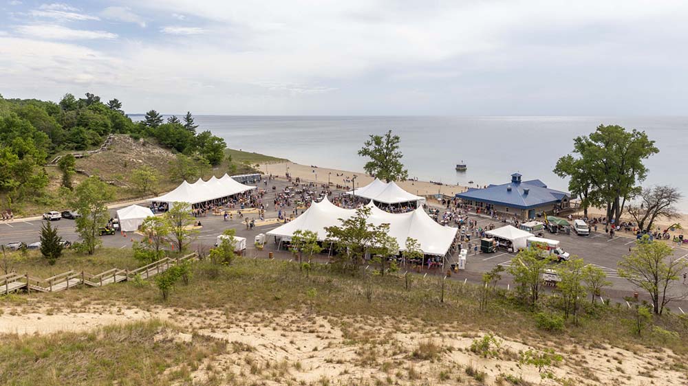 view of the festival from a dune
