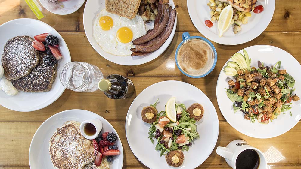 Table filled with food at Mason Jar Cafe.